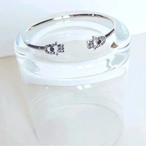 Zen Hamsa Hand Adjustable Silver Toned Bracelet with Rhinestones